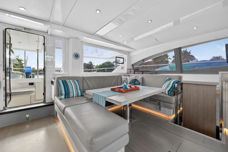 Slide: The Image of Luxurious interior of 2018 Leopard 51 Powercat yacht with modern seating and large windows. - 69