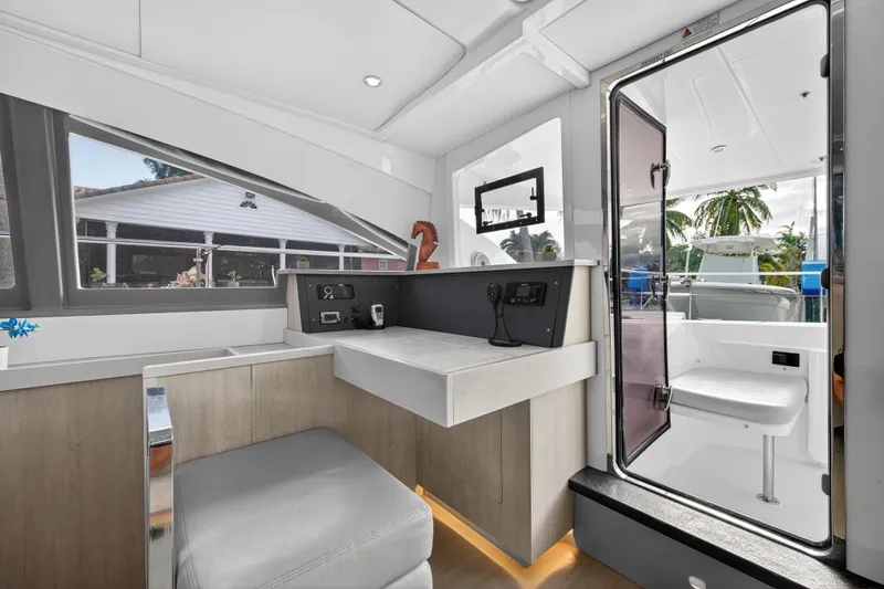 Slide: The Image of Interior of 2018 Leopard 51 Powercat yacht with modern seating and control panel. - 71