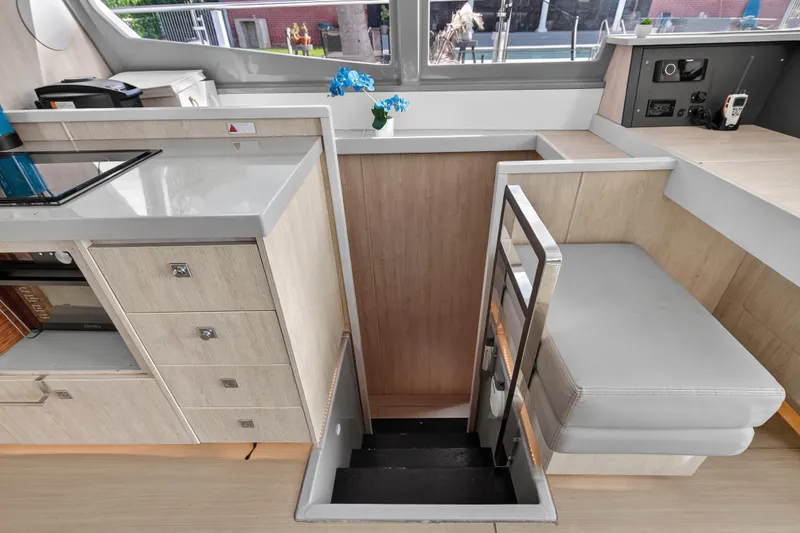 Slide: The Image of Interior of 2018 Leopard 51 Powercat featuring modern kitchen and seating area. - 76