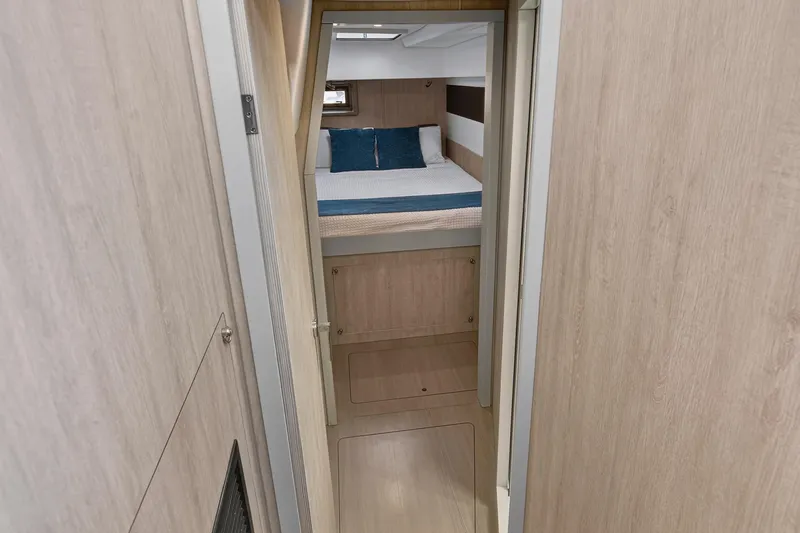 Slide: The Image of Interior cabin of 2018 Leopard 51 Powercat with modern wood finish and cozy bed. - 87