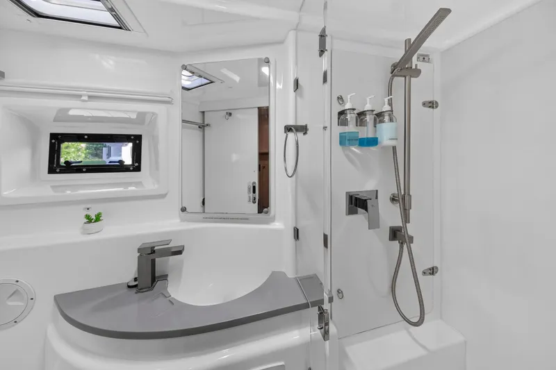 Slide: The Image of Modern bathroom in 2018 Leopard 51 Powercat yacht with sleek fixtures and shower amenities. - 90