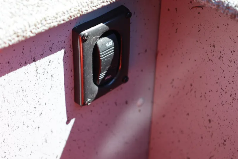 Slide: The Image of Switch panel on 2025 Lund SSV-18 boat interior, featuring a "NAV" toggle. - 26