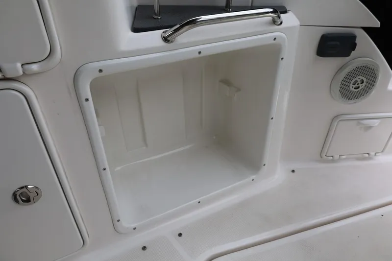 Slide: The Image of Storage compartment on a 2014 Regal 30 Express boat interior. - 15