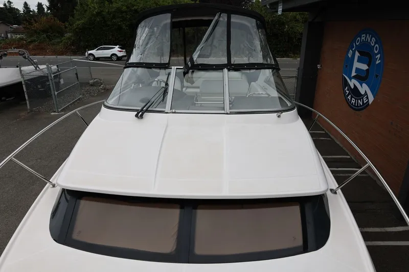 Slide: The Image of 2014 Regal 30 Express boat at Bjornson Marine dealership. - 72