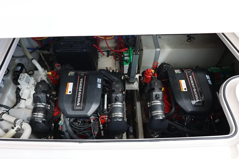 Slide: The Image of Engine compartment of a 2014 Regal 30 Express boat with Volvo Penta engines. - 79