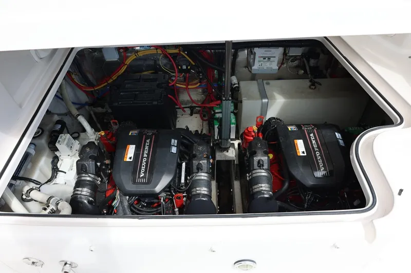 Slide: The Image of Engine compartment of 2014 Regal 30 Express with dual Volvo Penta engines. - 82