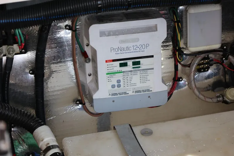 Slide: The Image of ProNautic 12-20P charger in 2014 Regal 30 Express engine compartment. - 83