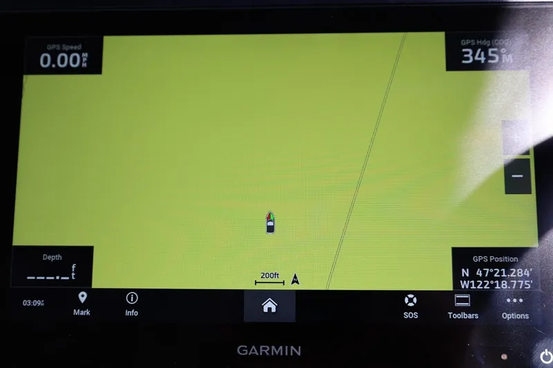 Slide: The Image of Garmin GPS display on 2014 Regal 30 Express boat, showing coordinates and navigation details. - 88