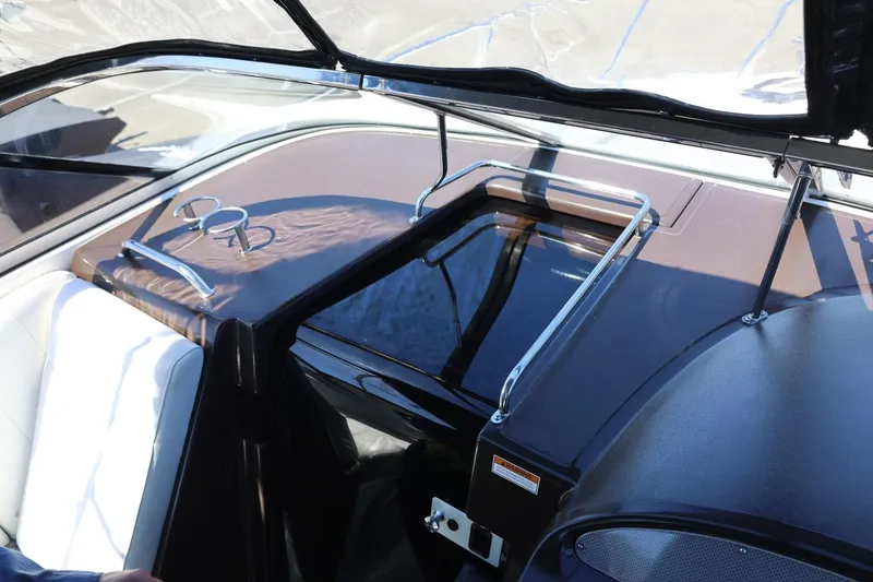 Slide: The Image of 2014 Regal 30 Express boat interior with sleek design and modern features. - 99