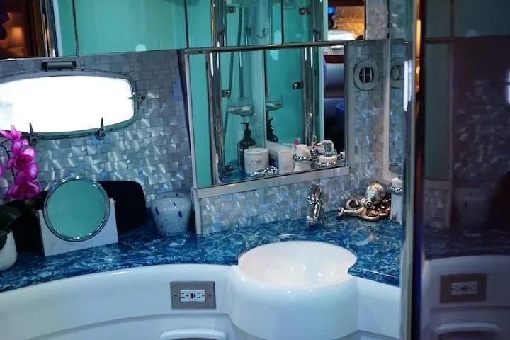 Slide: The Image of Luxurious bathroom interior of 2009 Fairline 52 Targa yacht with elegant blue countertop. - 17