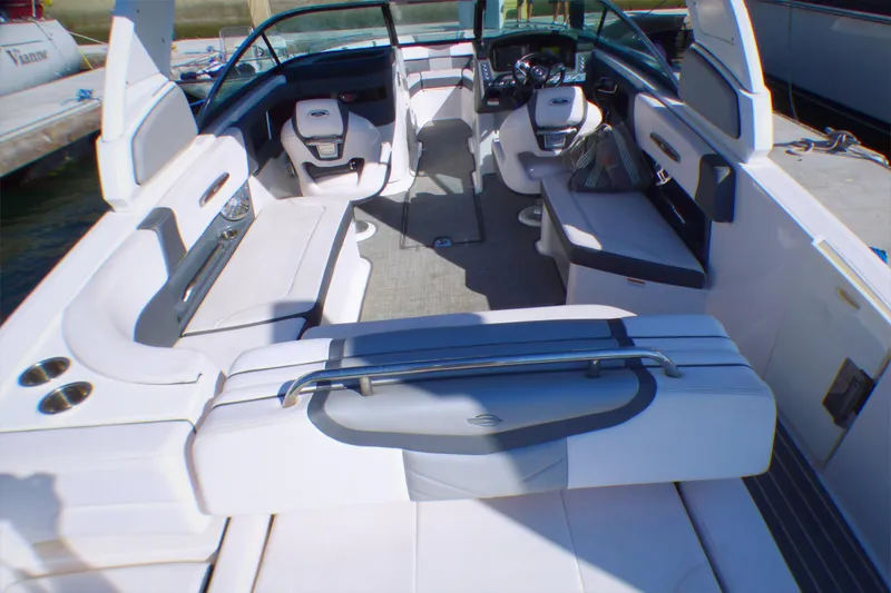 Slide: The Image of 2018 Chaparral 267 SSX boat interior with spacious seating and modern design. - 10