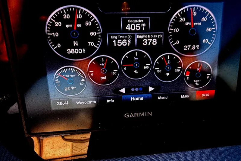 Slide: The Image of Dashboard display of a 2018 Chaparral 267 SSX showing engine metrics and GPS speed. - 14