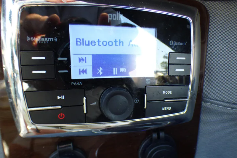 Slide: The Image of Polk audio system with Bluetooth in 2018 Chaparral 267 SSX boat. - 16