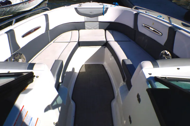 Slide: The Image of 2018 Chaparral 267 SSX boat interior with spacious seating and modern design. - 19