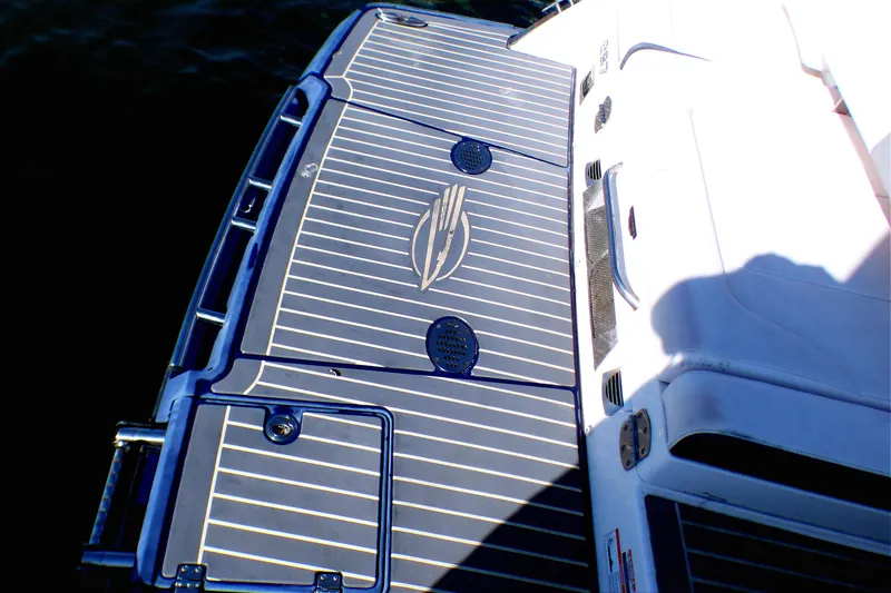 Slide: The Image of 2018 Chaparral 267 SSX boat deck with sleek design and logo detailing. - 9