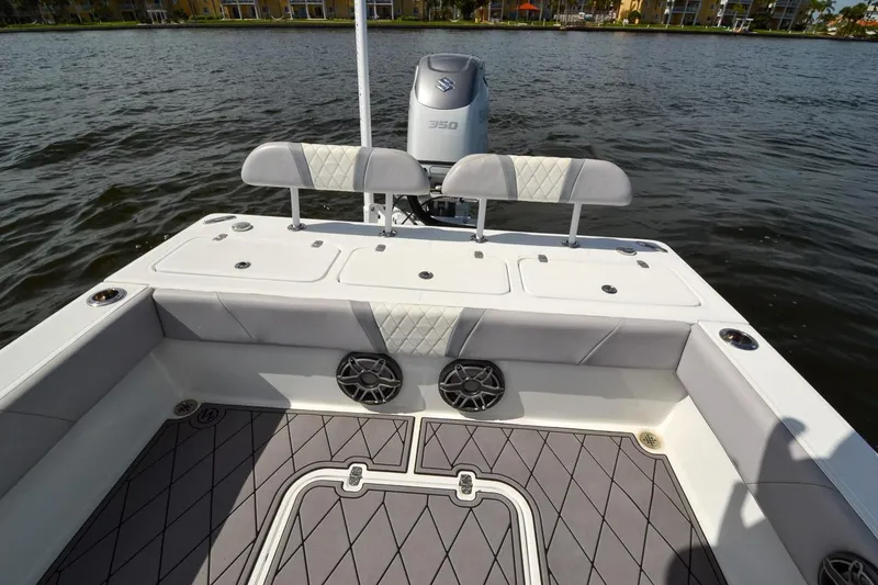 Slide: The Image of Canyon Bay 28h 2020 boat interior with seating and water view. - 32