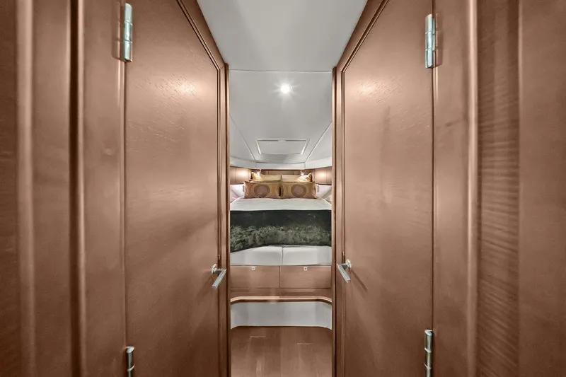 Slide: The Image of Luxurious cabin interior of 2012 Sea Ray 470 Sundancer yacht with wood paneling. - 22