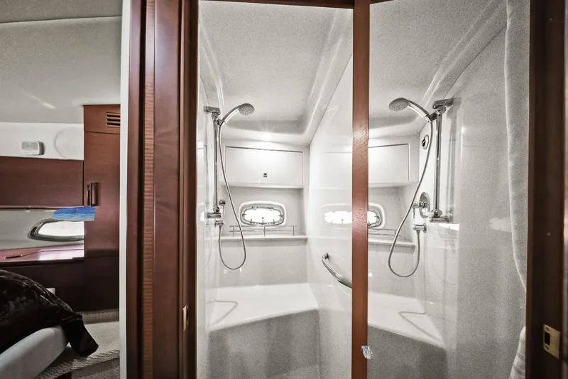 Slide: The Image of Luxurious bathroom interior of 2012 Sea Ray 470 Sundancer yacht with dual showerheads. - 27