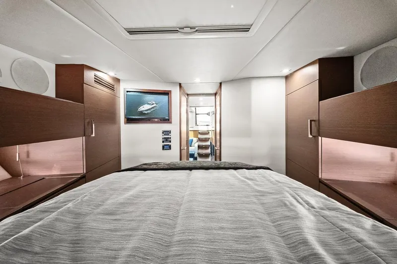 Slide: The Image of Luxurious cabin interior of 2012 Sea Ray 470 Sundancer yacht with modern wood finishes. - 28