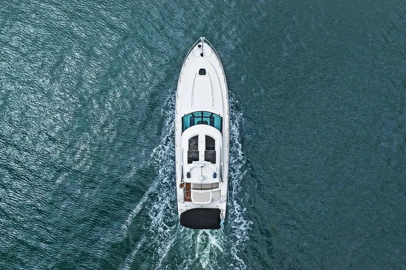 Slide: The Image of Aerial view of 2012 Sea Ray 470 Sundancer yacht cruising on open water. - 35