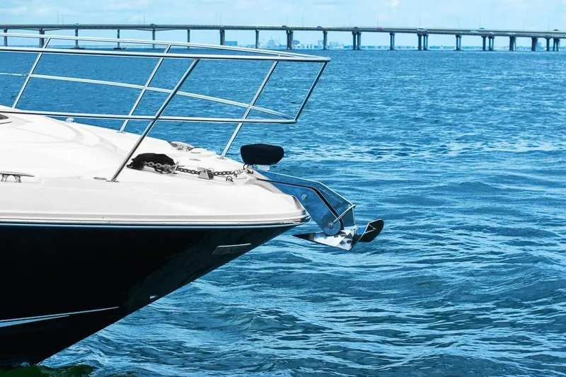 Slide: The Image of Bow of 2012 Sea Ray 470 Sundancer yacht on blue ocean with bridge in background. - 45