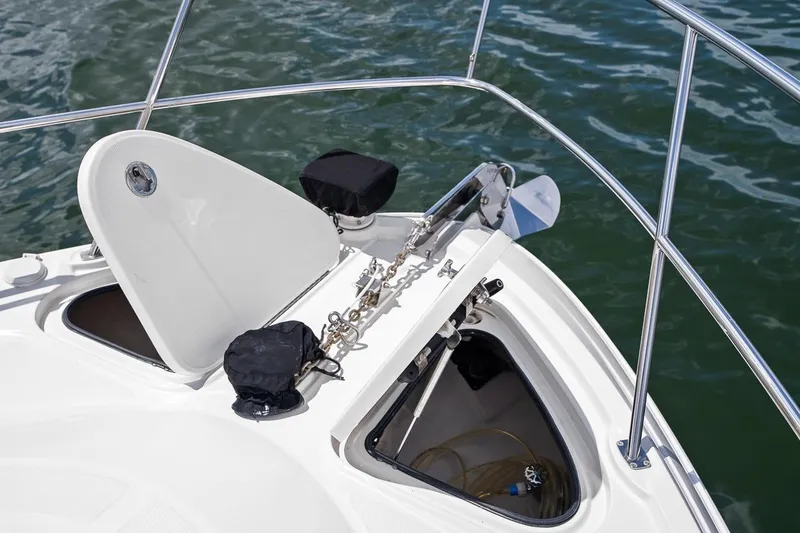 Slide: The Image of Bow of 2012 Sea Ray 470 Sundancer yacht with anchor and railing. - 53
