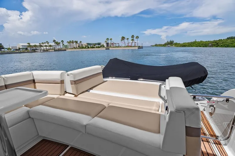 Slide: The Image of 2012 Sea Ray 470 Sundancer yacht interior with scenic waterfront view. - 55