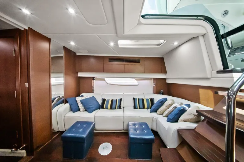 Slide: The Image of Luxurious interior of 2012 Sea Ray 470 Sundancer yacht with plush seating and modern design. - 6