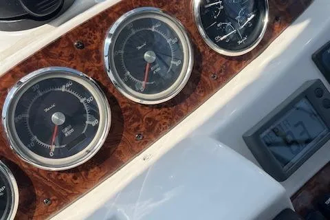 Slide: The Image of Dashboard of 2005 Meridian 368 Motoryacht with gauges and digital display. - 15