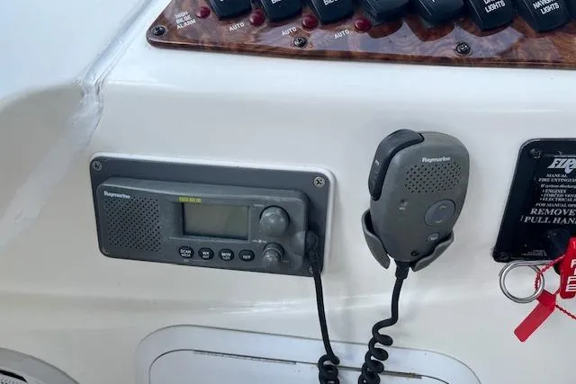 Slide: The Image of Control panel of 2005 Meridian 368 Motoryacht with Raymarine radio and microphone. - 20