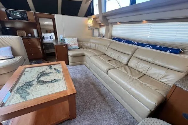 Slide: The Image of Luxurious interior of 2005 Meridian 368 Motoryacht with leather seating and nautical decor. - 32
