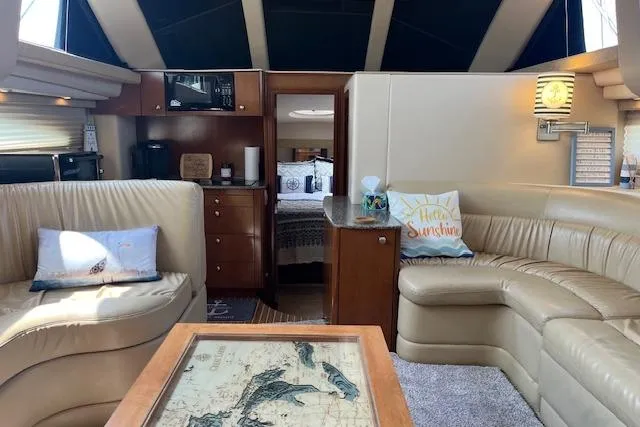 Slide: The Image of Luxurious interior of 2005 Meridian 368 Motoryacht with leather seating and nautical decor. - 33