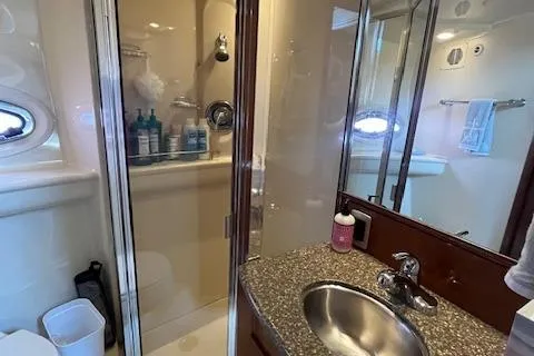 Slide: The Image of 2005 Meridian 368 Motoryacht bathroom with shower, sink, and toiletries. - 37