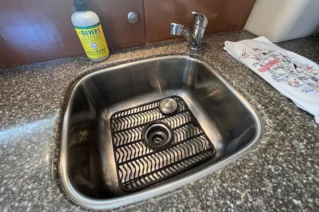 Slide: The Image of Stainless steel sink in 2005 Meridian 368 Motoryacht kitchen with soap and towel. - 46