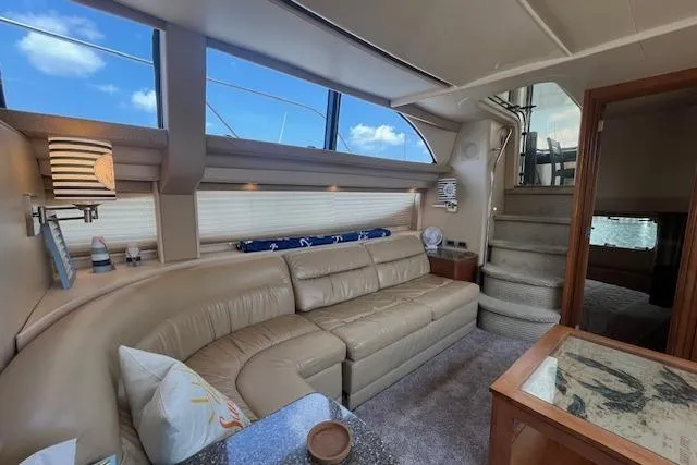 Slide: The Image of Luxurious interior of 2005 Meridian 368 Motoryacht with beige leather seating and elegant decor. - 52