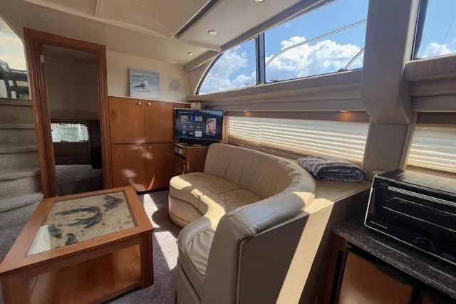 Slide: The Image of Luxurious interior of 2005 Meridian 368 Motoryacht with plush seating and elegant decor. - 53