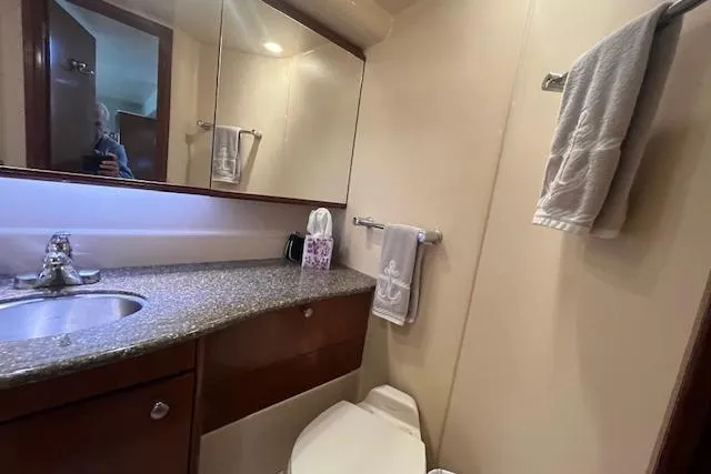 Slide: The Image of Bathroom interior of 2005 Meridian 368 Motoryacht with sink, mirror, and towels. - 63