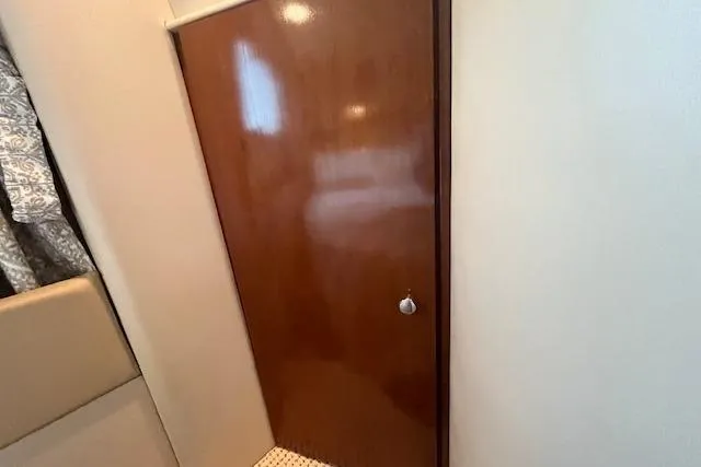 Slide: The Image of Interior of 2005 Meridian 368 Motoryacht with wooden door and patterned flooring. - 65