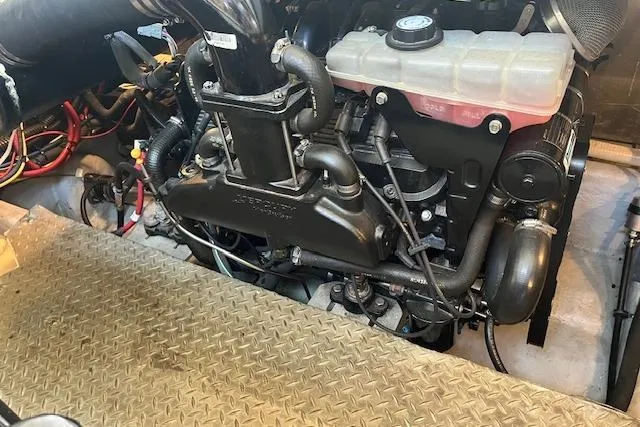 Slide: The Image of Engine compartment of a 2005 Meridian 368 Motoryacht with visible components and wiring. - 70