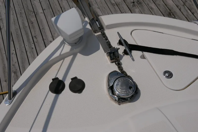 Slide: The Image of 2005 Meridian 368 Motoryacht deck with anchor chain and cleat. - 9