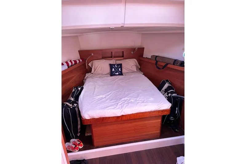 Slide: The Image of Cozy cabin interior of 2014 Hanse 445 yacht with a neatly made bed. - 20