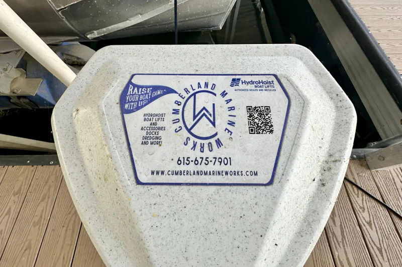 Slide: The Image of QR code and contact details on Cumberland Marine Works boat lift platform. - 17