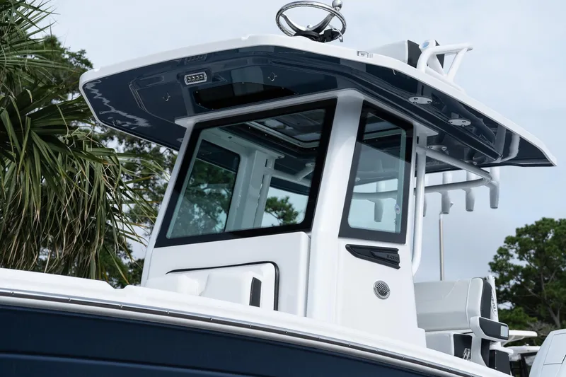Slide: The Image of 2026 Blackfin 262 HB boat with sleek design and modern features. - 14