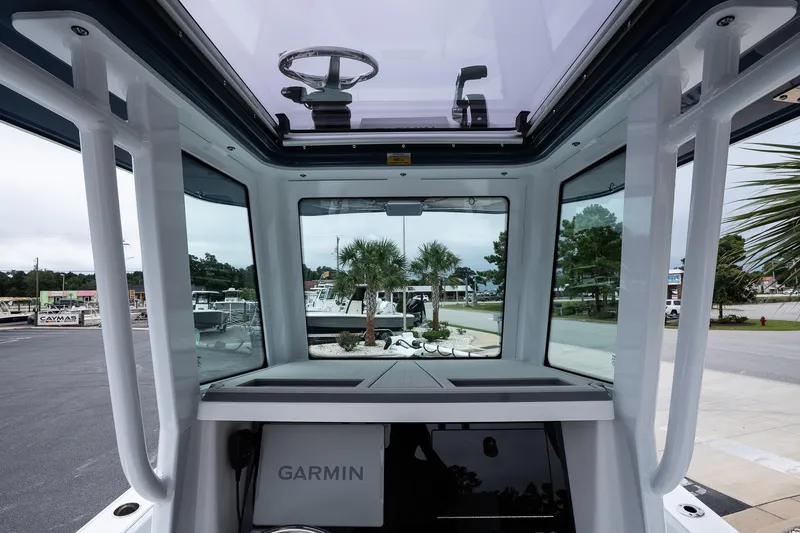 Slide: The Image of Interior view of 2026 Blackfin 262 HB boat with Garmin equipment. - 31