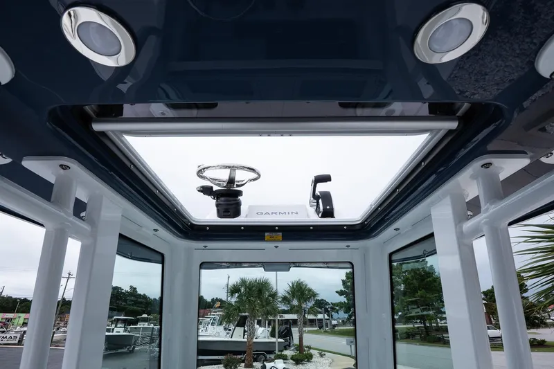 Slide: The Image of Interior view of 2026 Blackfin 262 HB boat with Garmin equipment. - 32