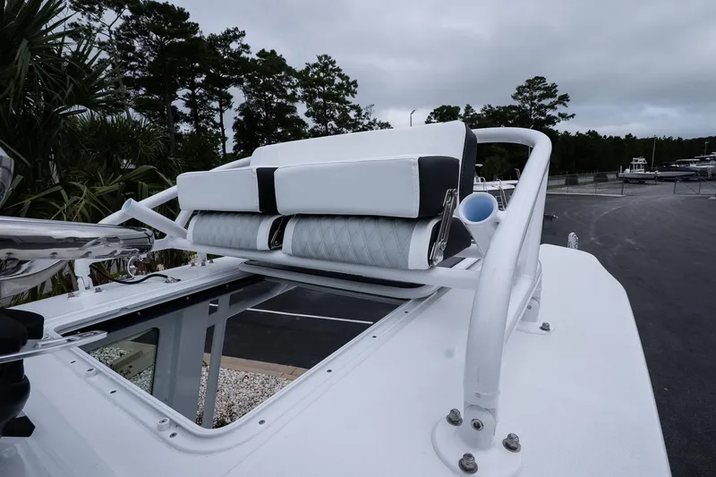 Slide: The Image of 2026 Blackfin 262 HB boat with cushioned seating and sleek design. - 34
