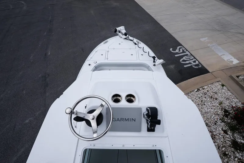 Slide: The Image of Top view of 2026 Blackfin 262 HB boat with Garmin equipment and steering wheel. - 35