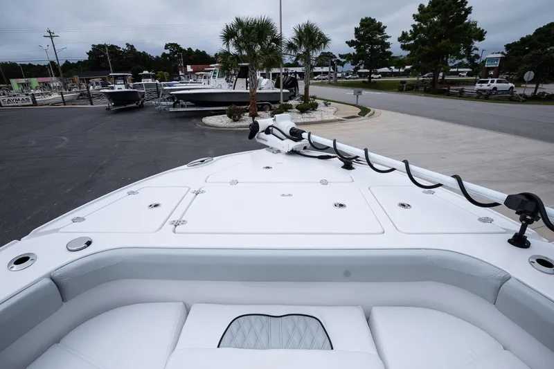 Slide: The Image of 2026 Blackfin 262 HB boat at a marina, showcasing sleek deck design. - 41