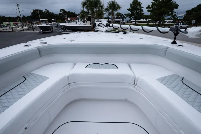Slide: The Image of 2026 Blackfin 262 HB boat with spacious white seating area and sleek design. - 43