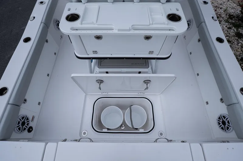Slide: The Image of 2026 Blackfin 262 HB boat interior with storage compartments and seating. - 51